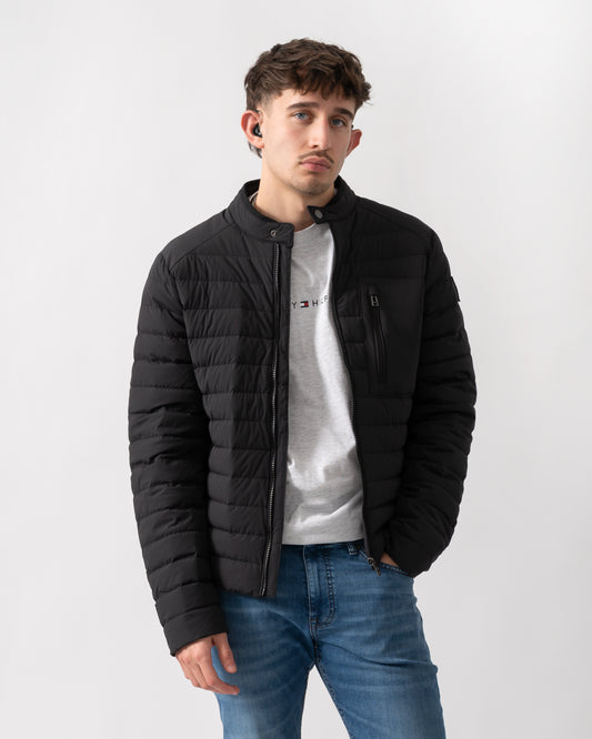 studio shot of a model wearing a Belstaff Chassis Mens Jacket in Black