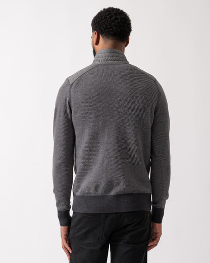back shot of a model wearing a Belstaff Kilmington Mens Quarter Zip Funnel Neck Jumper in Charcoal-Mid Grey