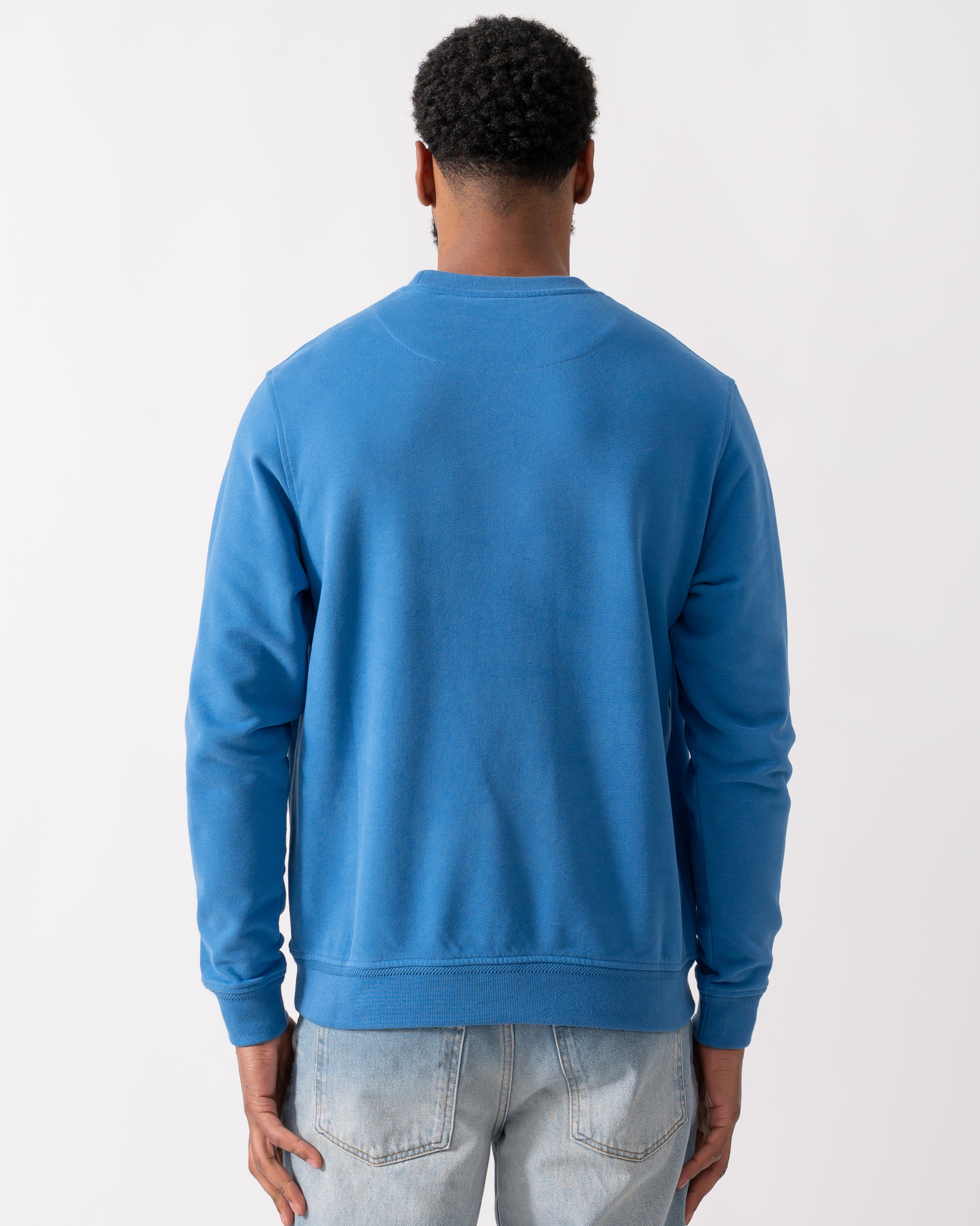 back of a Belstaff Mens Crew Neck Sweatshirt With Logo Patch in Marine Blue