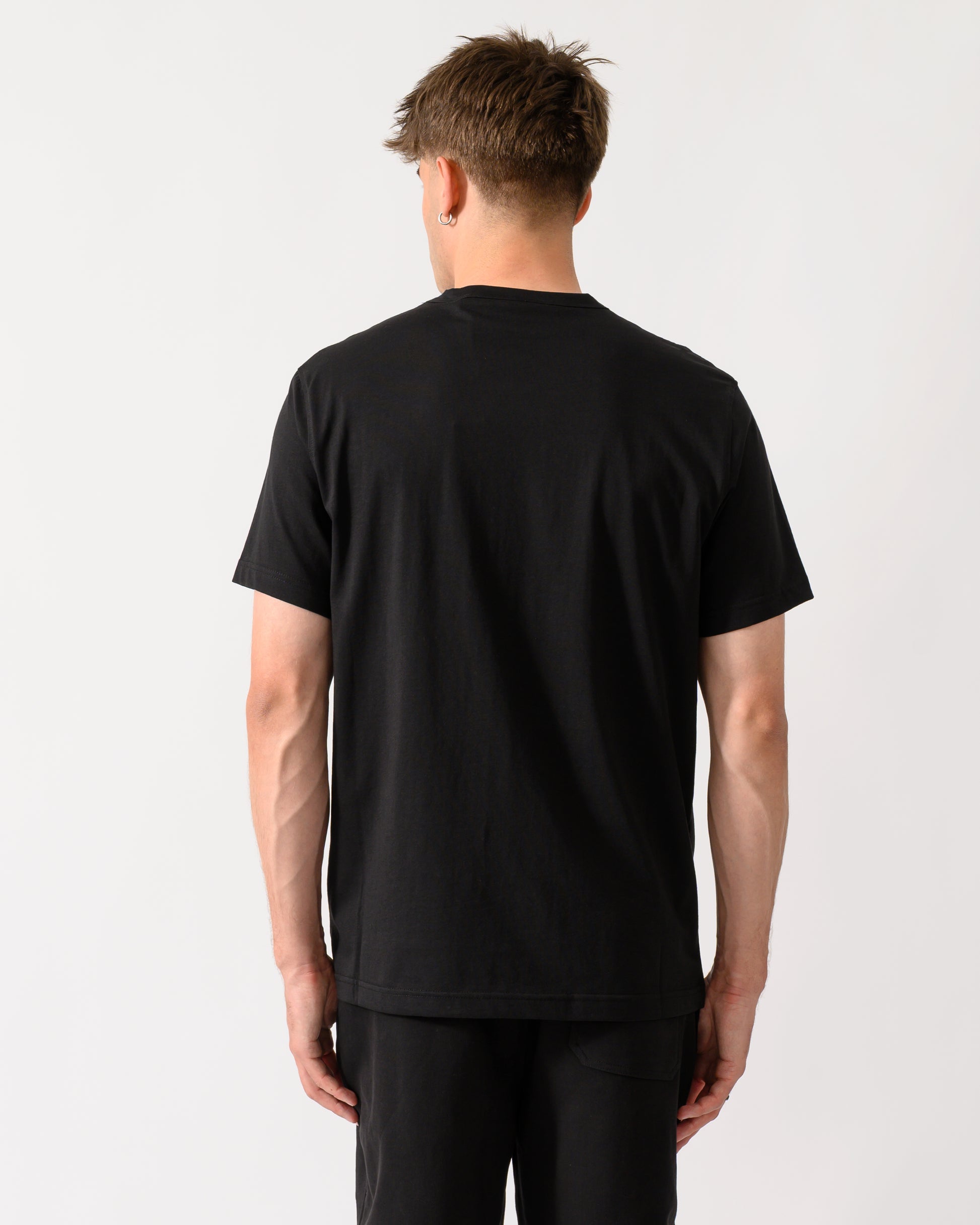 back shot of a model wearing a Belstaff Mens Icon Logo T-Shirt in Black