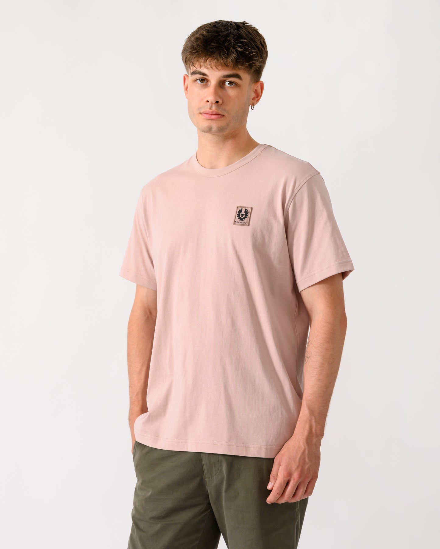 model wearing a Belstaff Mens Icon Logo T-Shirt in Dusk Pink