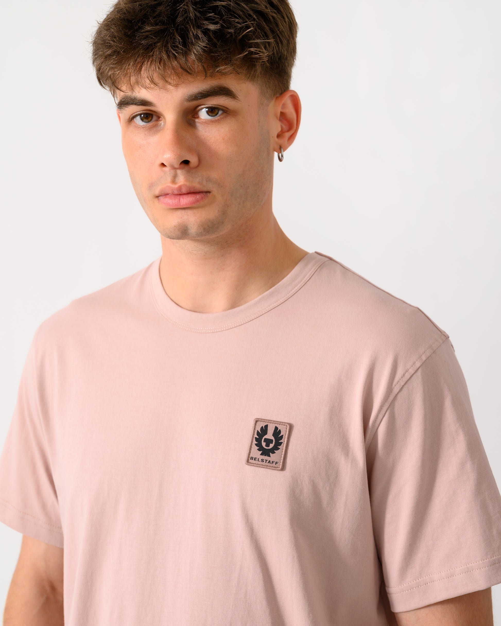 close up shot of model wearing a Belstaff Mens Icon Logo T-Shirt in Dusk Pink
