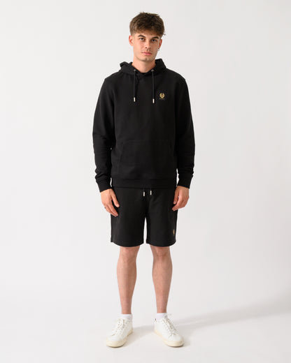 full length shot of a model wearing a Belstaff Mens Logo Hoodie in Black