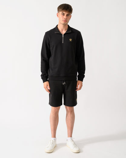 full length shot of a model wearing a Belstaff Mens Logo Quarter Zip Sweatshirt in Black