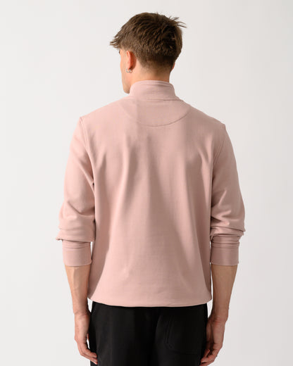 back shot of a model wearing a Belstaff Mens Logo Quarter Zip Sweatshirt in Dusk Pink