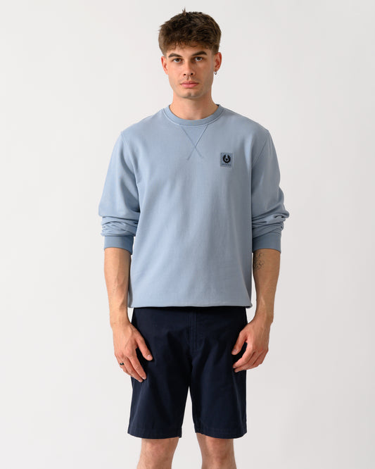 model wearing a Belstaff Mens Logo Sweatshirt in Mist Blue