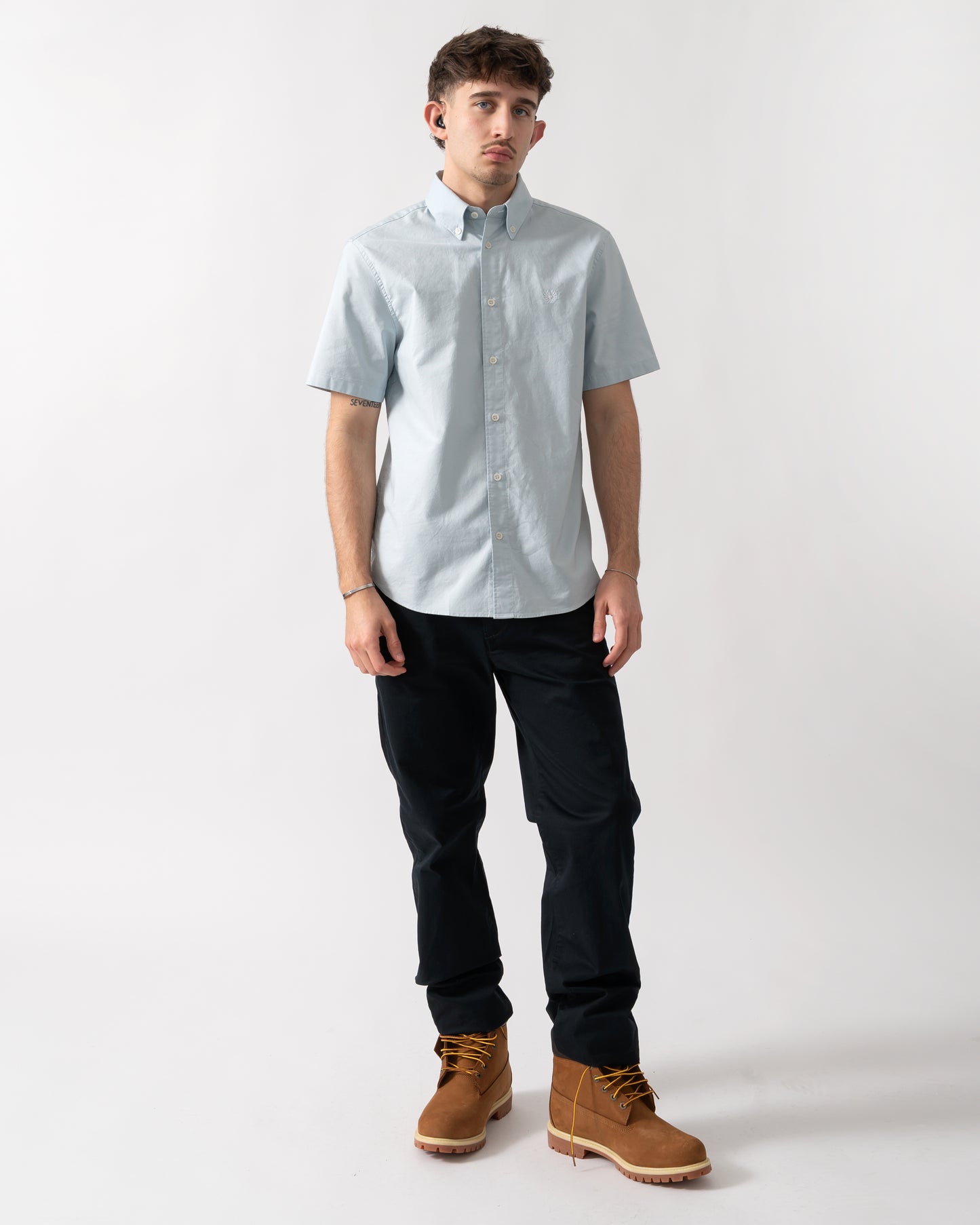 full length shot of a model wearing a Belstaff Mens Short Sleeve Street Shirt in Sky Blue