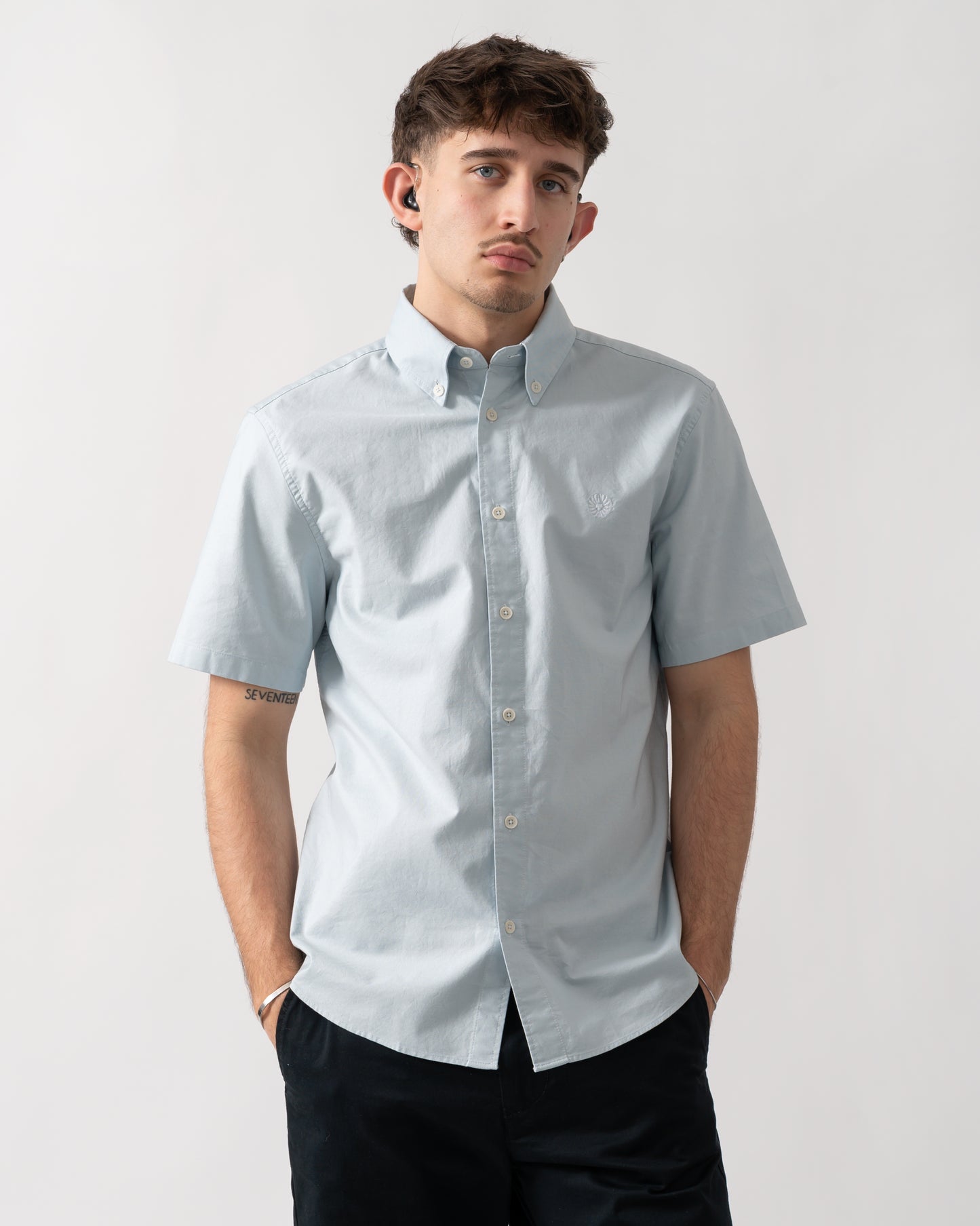 studio shot of a model wearing a Belstaff Mens Short Sleeve Street Shirt in Sky Blue