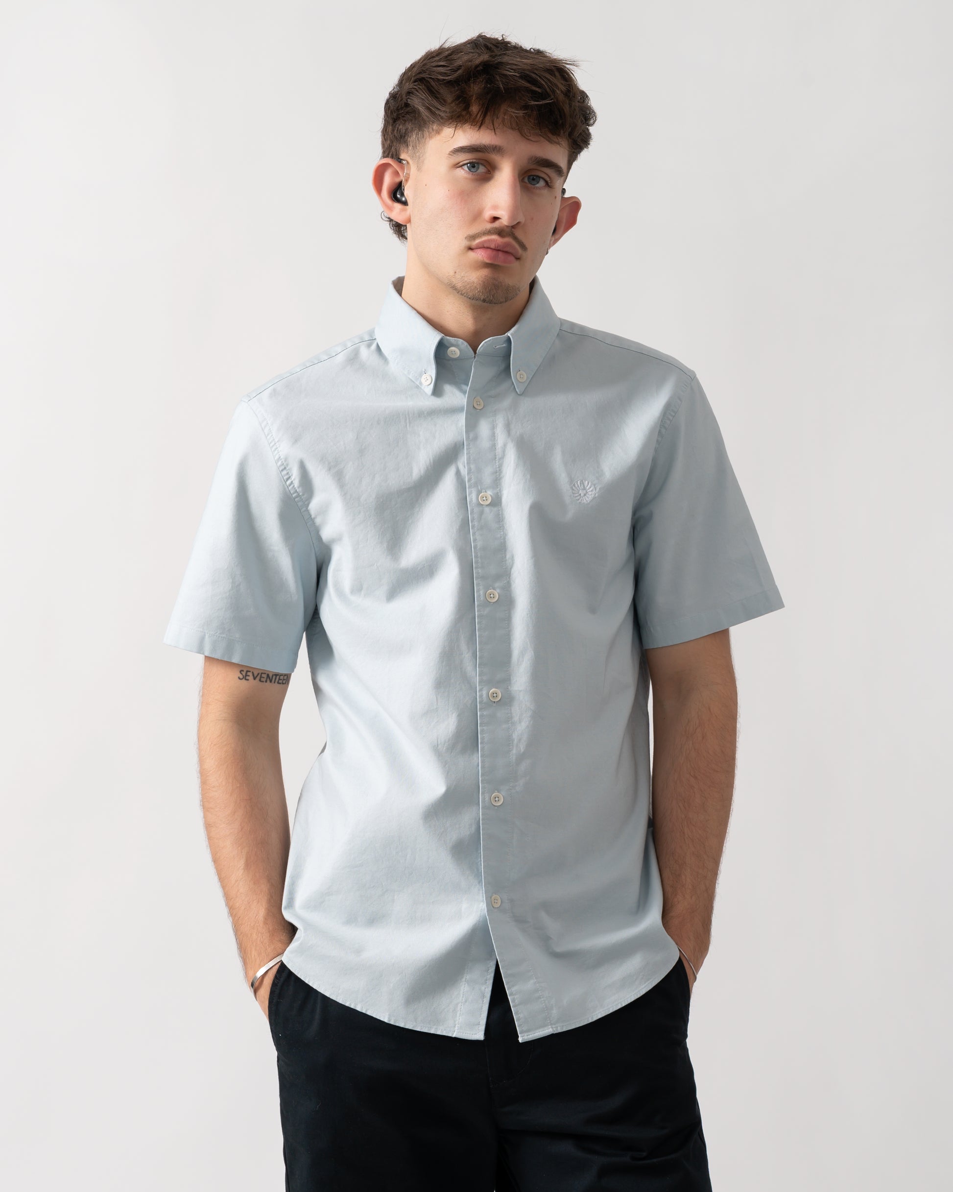 studio shot of a model wearing a Belstaff Mens Short Sleeve Street Shirt in Sky Blue