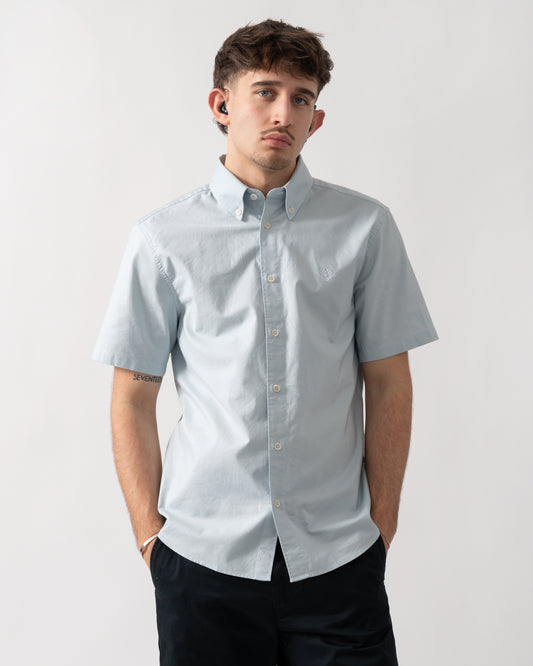 studio shot of a model wearing a Belstaff Mens Short Sleeve Street Shirt in Sky Blue