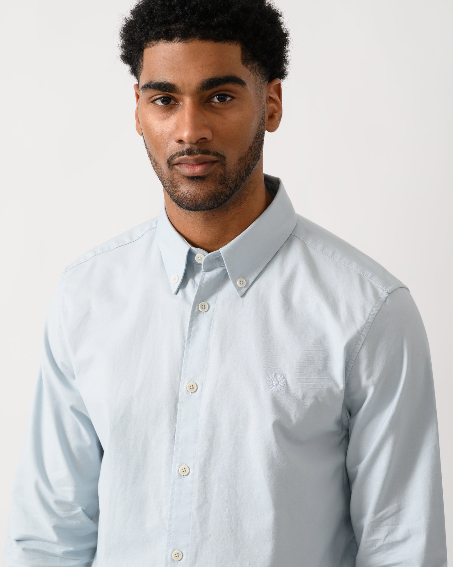 detail shot of a model wearing a Belstaff Mens Street Shirt in Sky Blue