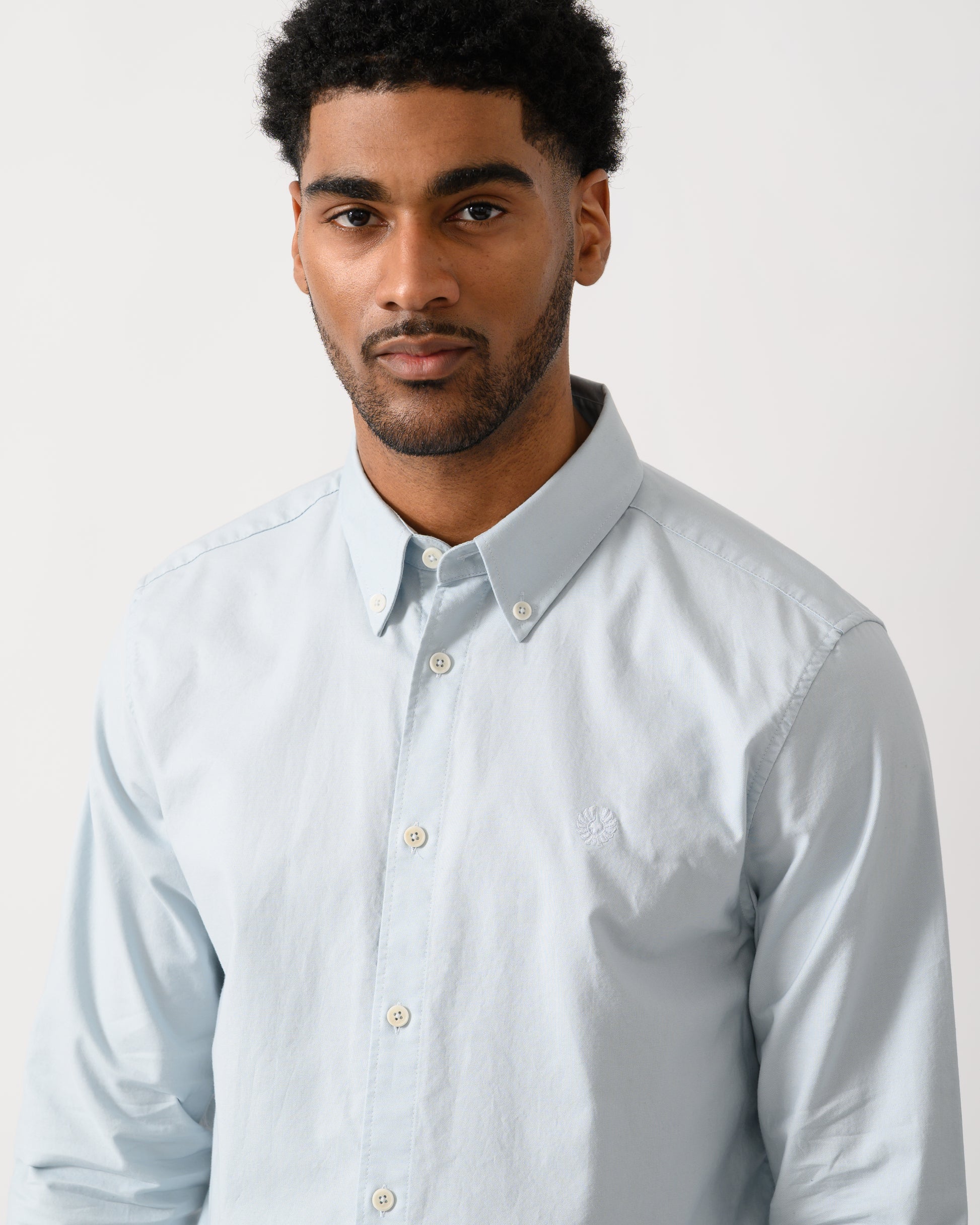 detail shot of a model wearing a Belstaff Mens Street Shirt in Sky Blue