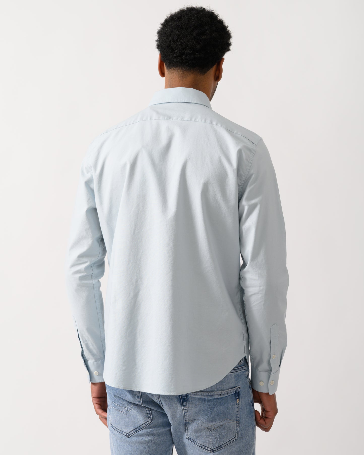 back view of a model wearing a Belstaff Mens Street Shirt in Sky Blue