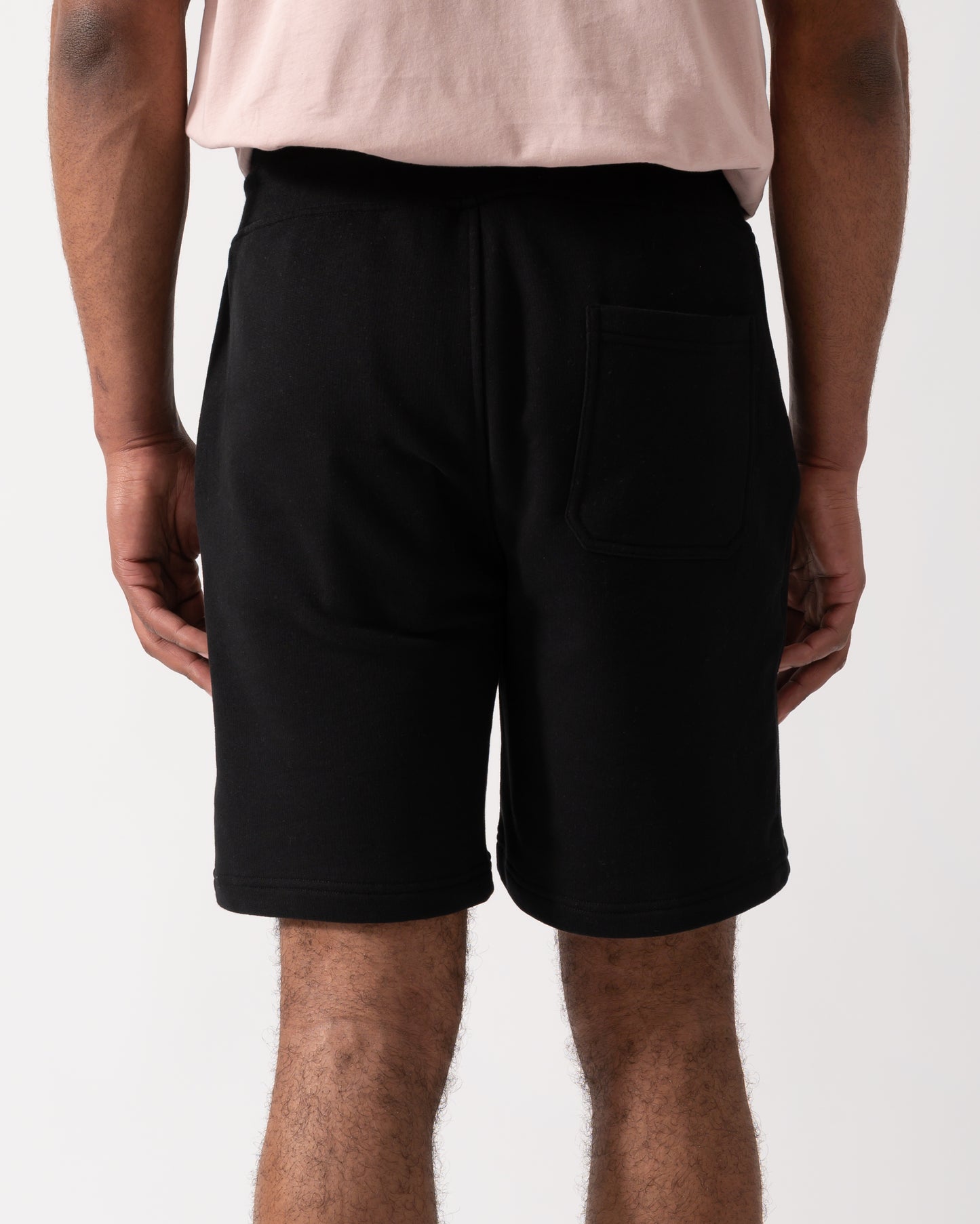 Back shot of a model wearing Belstaff Mens Sweatshorts in Black