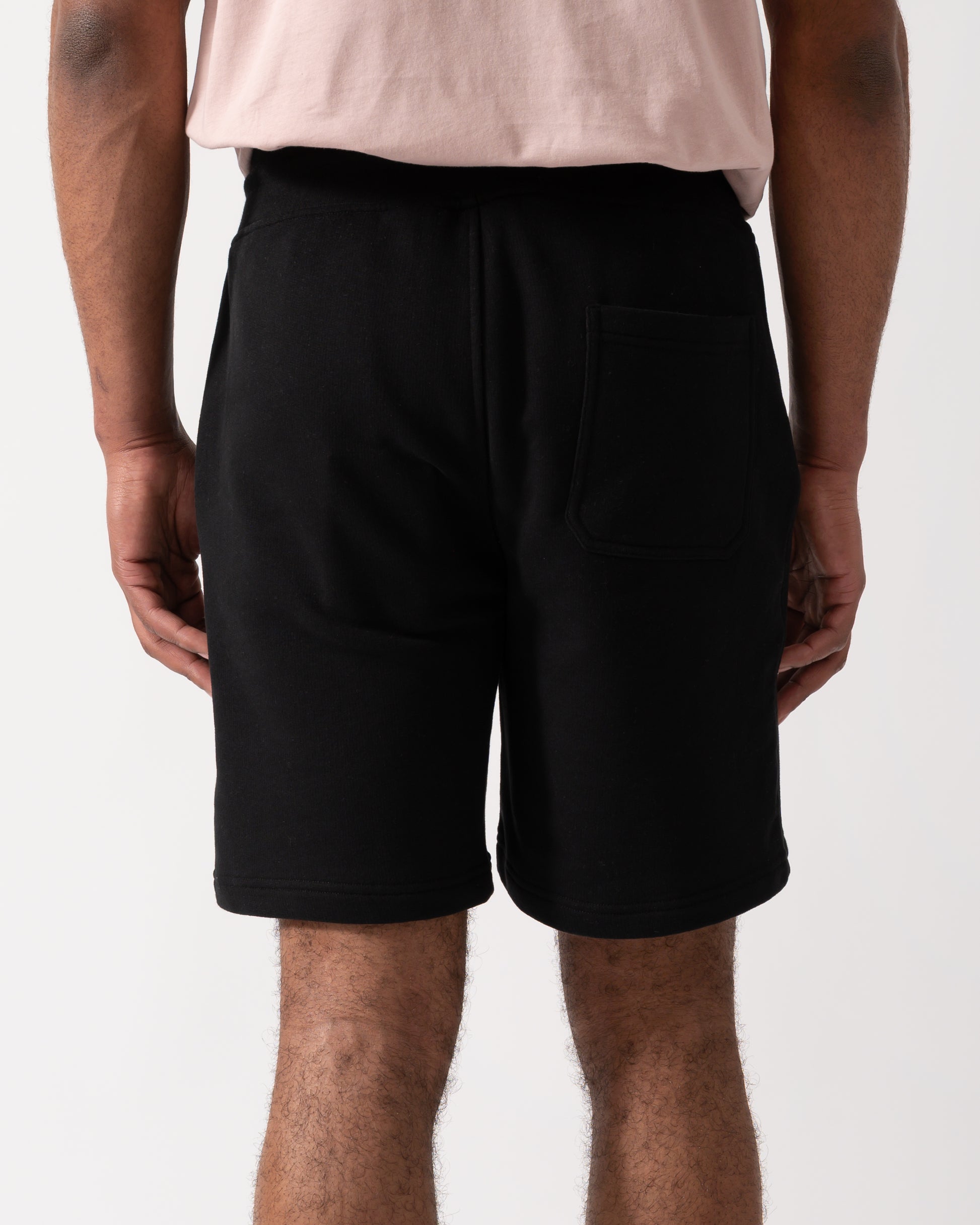 Back shot of a model wearing Belstaff Mens Sweatshorts in Black