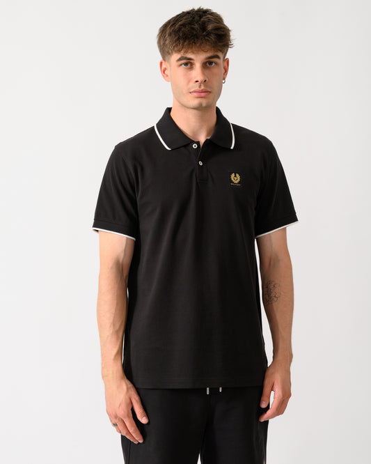 model wearing a Belstaff Mens Tipped Polo Shirt in Black