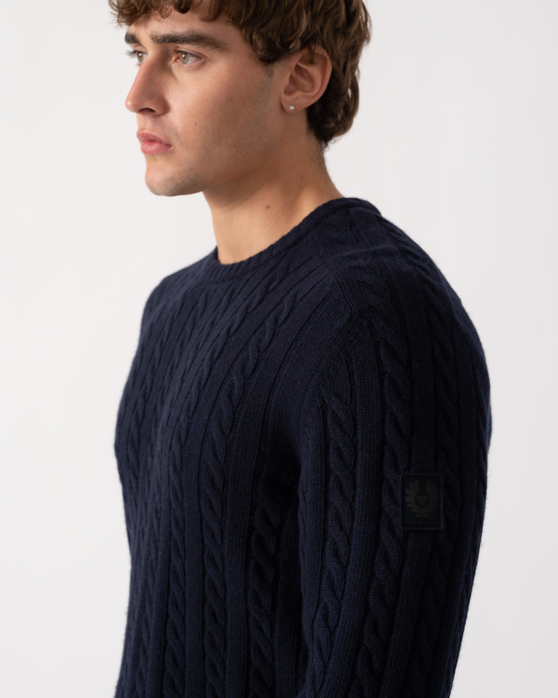 Logo close up of Belstaff Mens Westport Crew Neck Cable Knit Jumper - Dark Ink