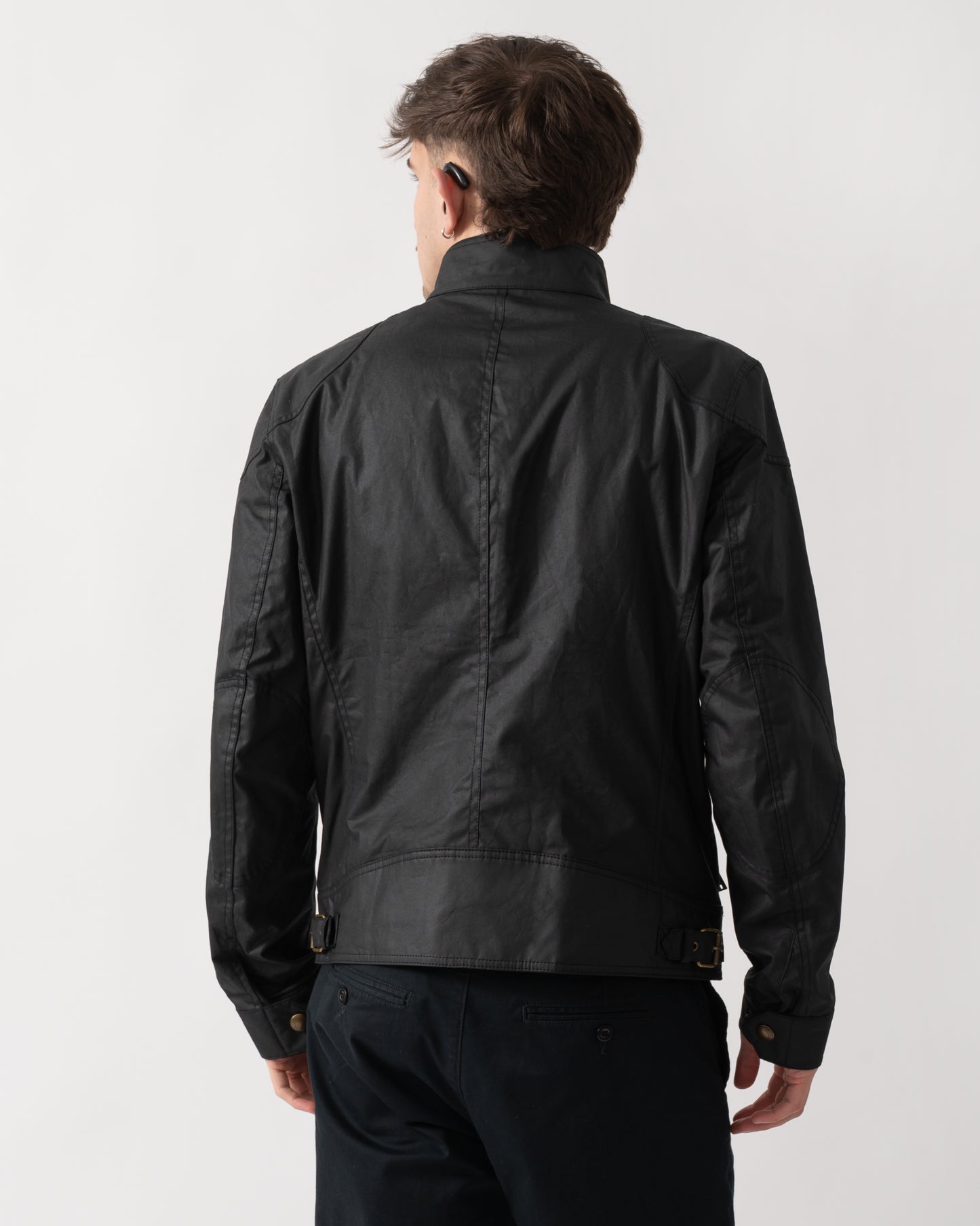 back shot of a model wearing a Belstaff Racemaster Mens Waxed Cotton Compact Field Jacket in Black