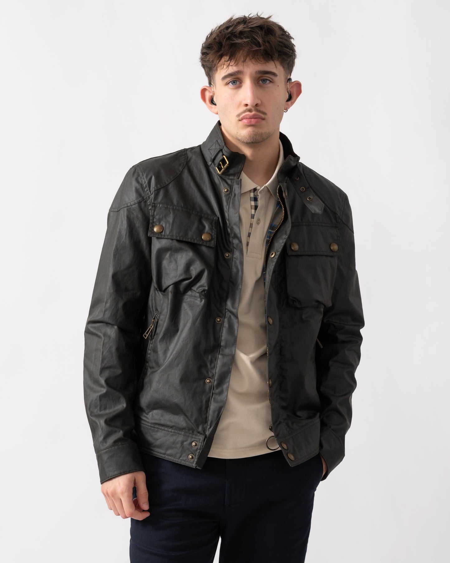 mid shot of a model wearing a Belstaff Racemaster Mens Waxed Cotton Compact Field Jacket in Faded Olive