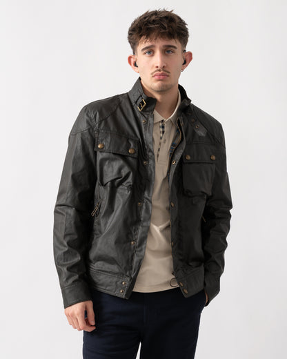 mid shot of a model wearing a Belstaff Racemaster Mens Waxed Cotton Compact Field Jacket in Faded Olive