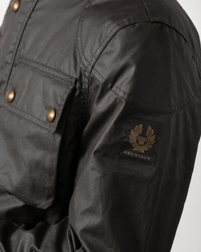 logo detail of a Belstaff Racemaster Mens Waxed Cotton Compact Field Jacket in Faded Olive