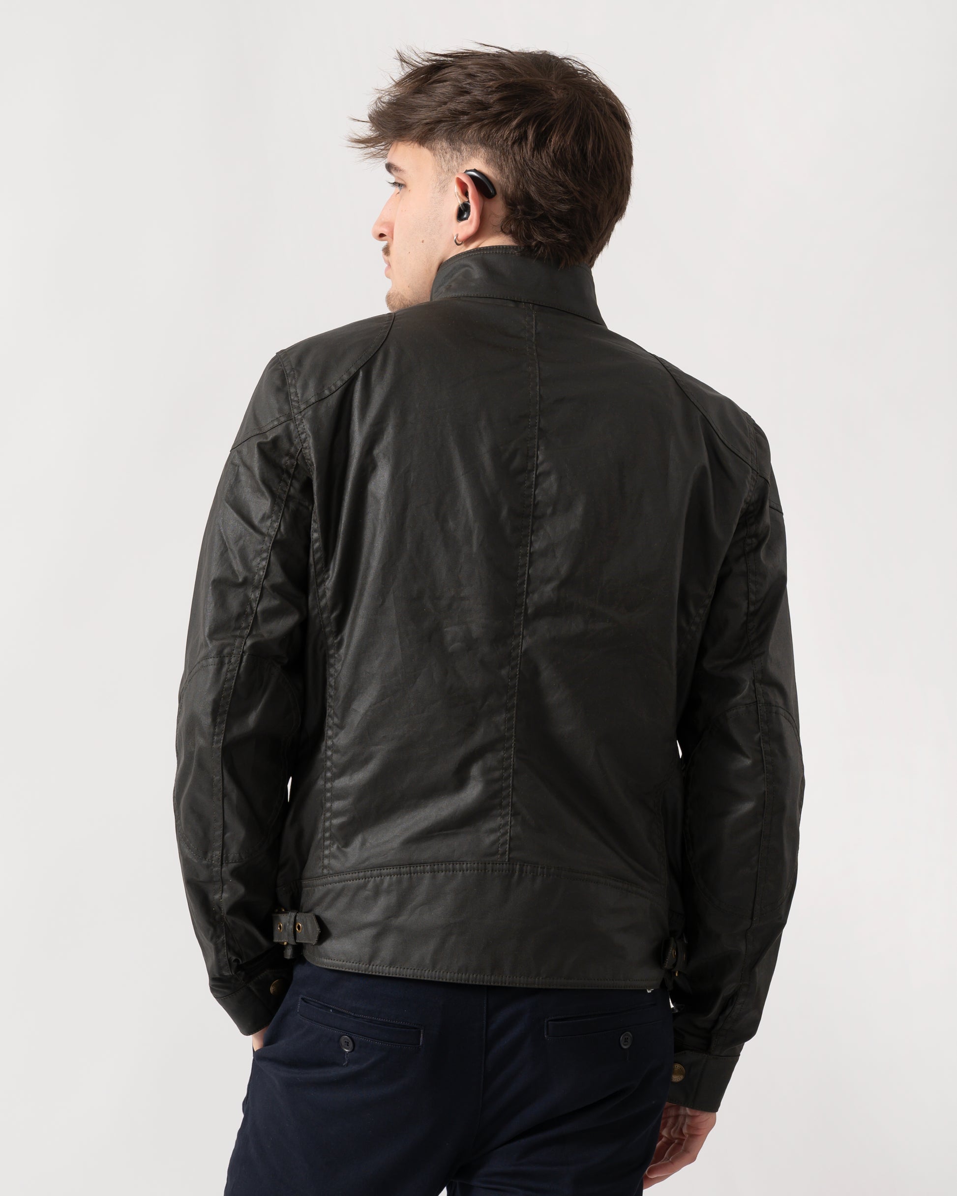 back of a Belstaff Racemaster Mens Waxed Cotton Compact Field Jacket in Faded Olive