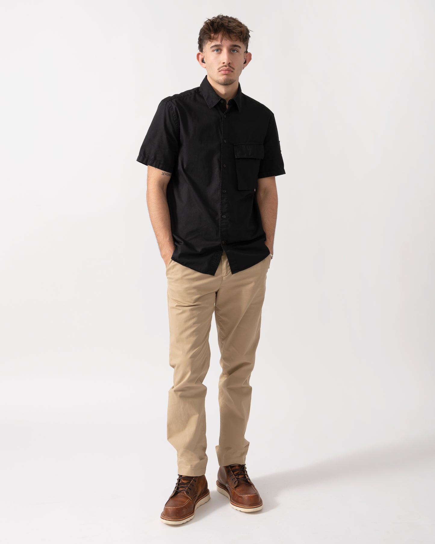 Full length shot of a Model wearing a Belstaff Scale Mens Short Sleeve Shirt in Black