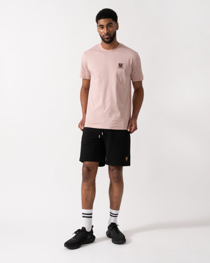 Full length shot of a Model wearing a Belstaff Short Sleeved Mens Logo Patch T-Shirt  in Dusk Pink