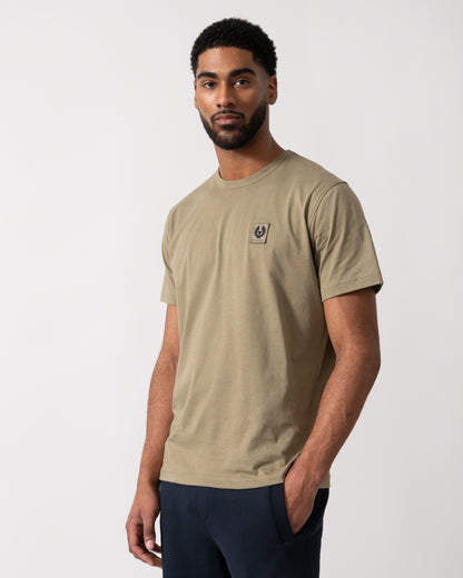 Model wearing a Belstaff Short Sleeved Mens Logo Patch T-Shirt in Fatigue Green