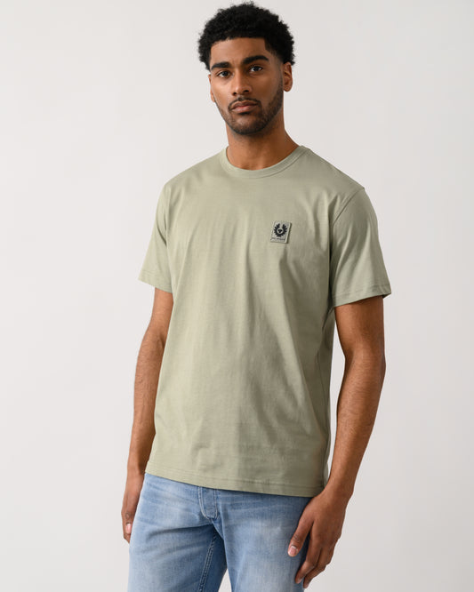 Model wearing a Belstaff Short Sleeved Mens Logo Patch T-Shirt in Lichen colour
