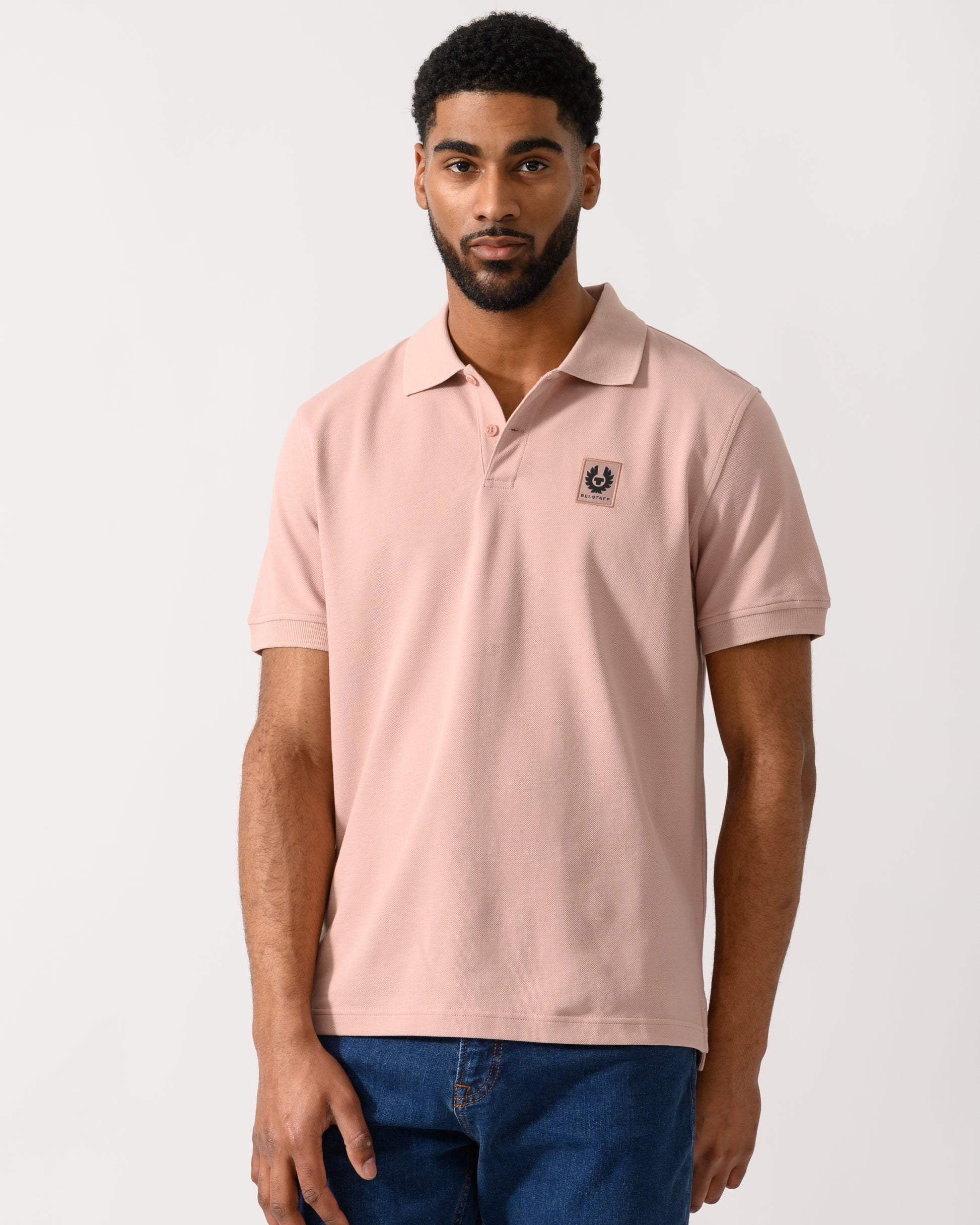 Model wearing a Belstaff Short Sleeved Mens Polo in Dusk Pink
