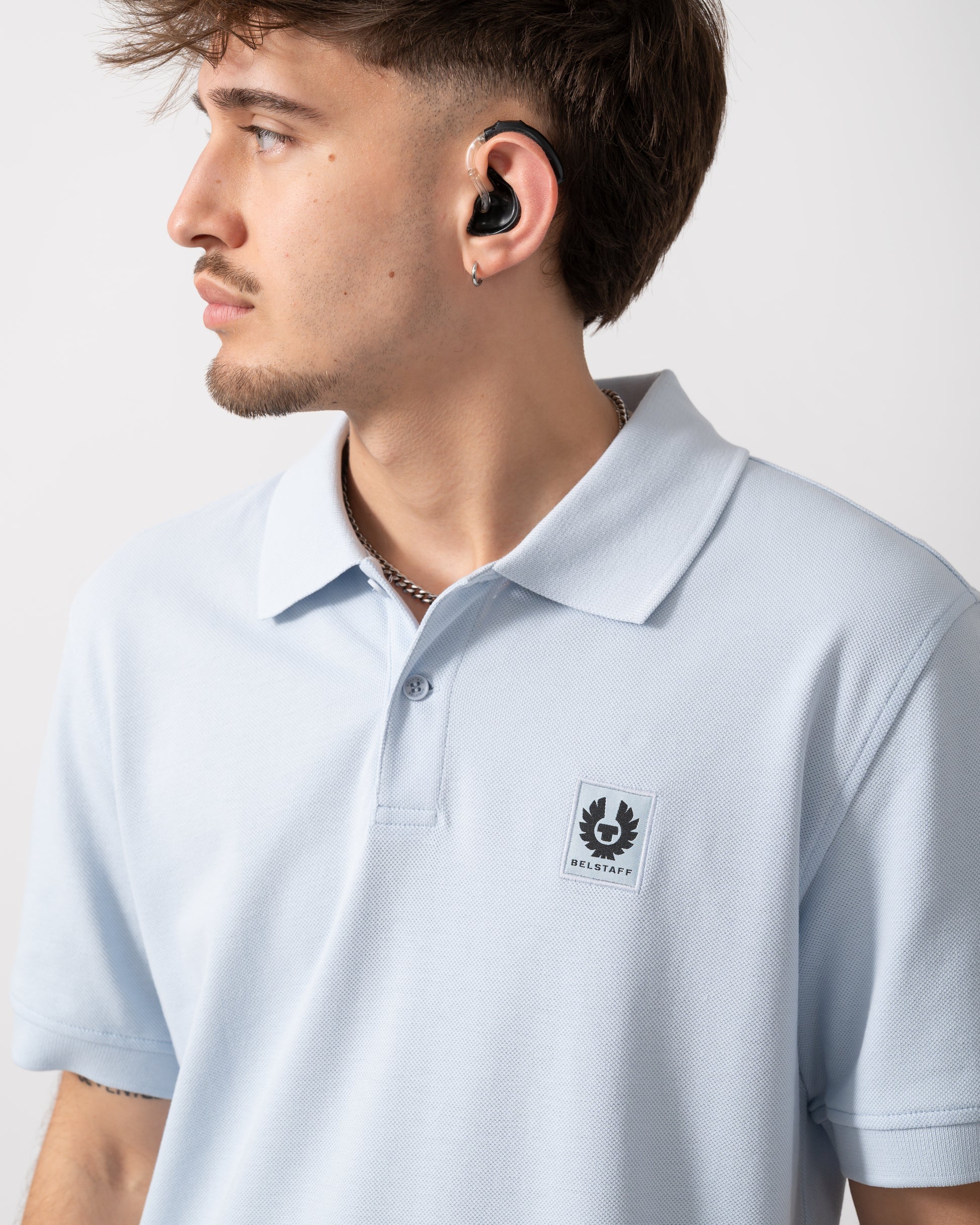 Detail of a Model wearing a Belstaff Short Sleeved Mens Polo in Sky Blue