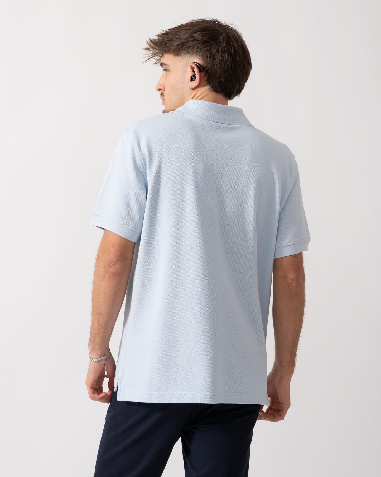 Back of a Model wearing a Belstaff Short Sleeved Mens Polo in Sky Blue