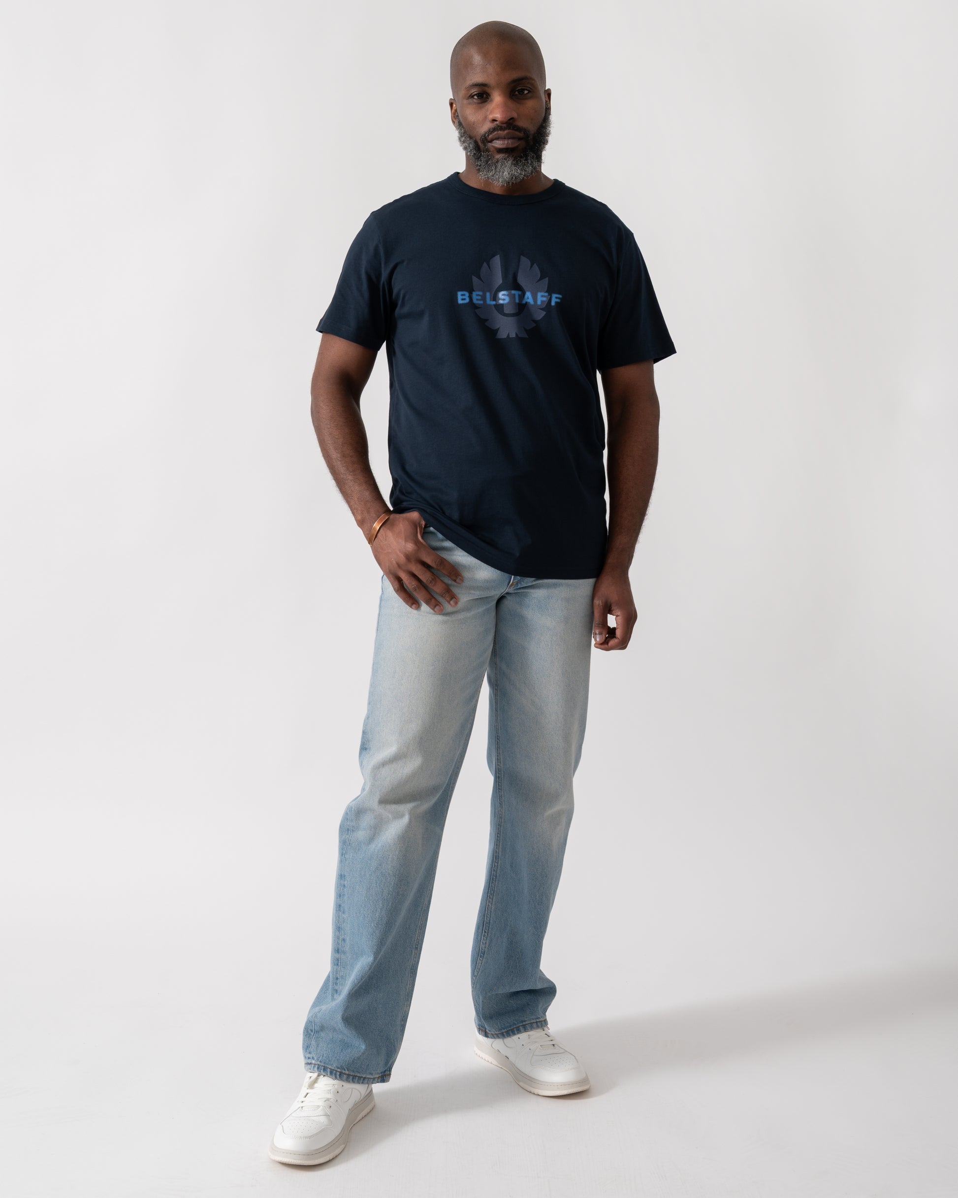 Full length shot of a Model wearing a Belstaff Surface Mens T-Shirt in Dark Ink