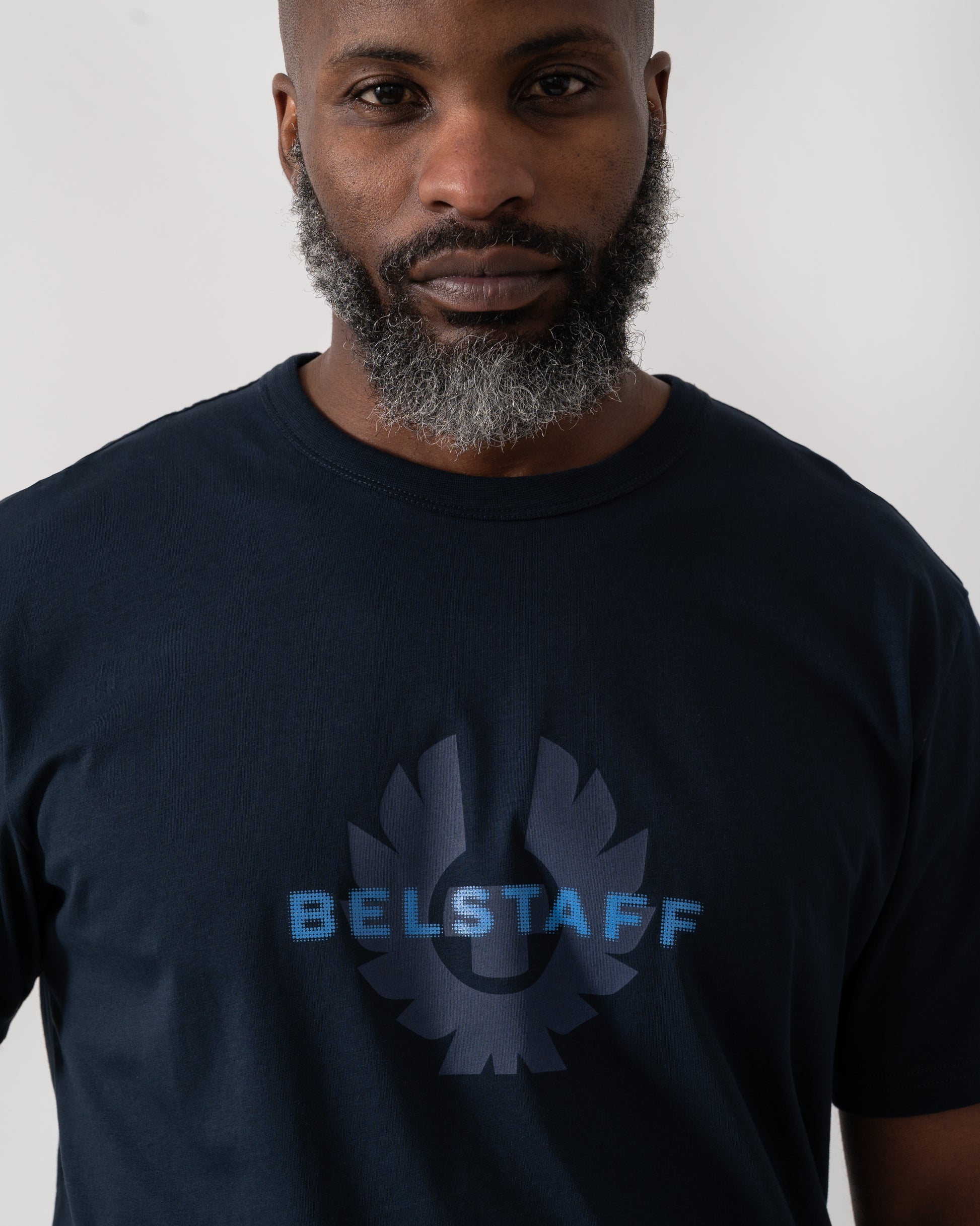 close up shot of a Model wearing a Belstaff Surface Mens T-Shirt in Dark Ink
