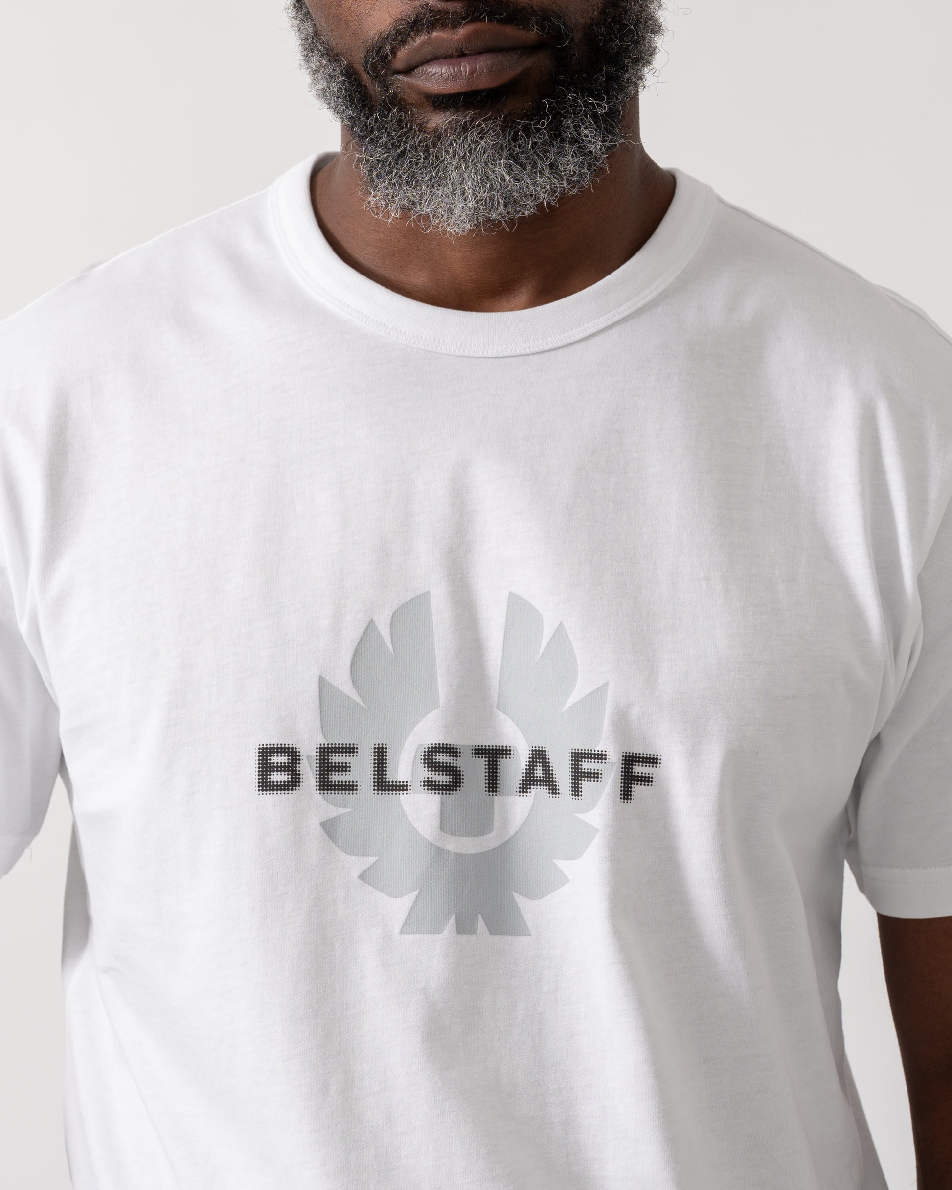 Deteil shot of a Model wearing a Belstaff Surface Mens T-Shirt in White