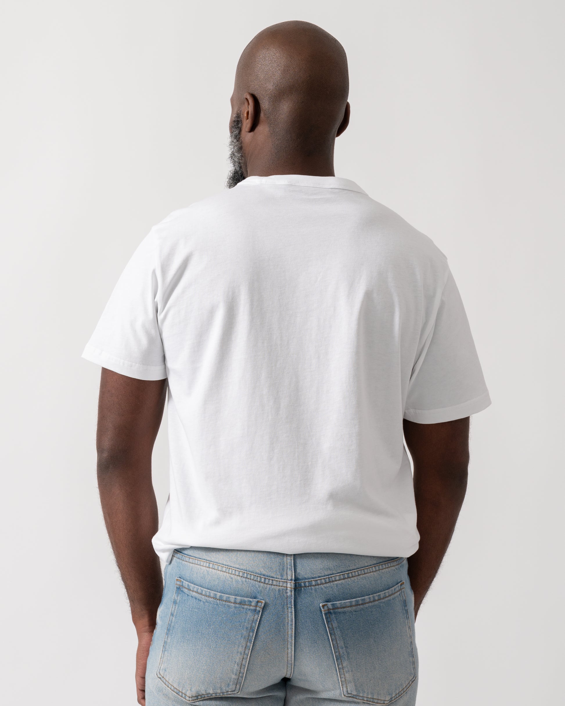 Back shot of a Model wearing a Belstaff Surface Mens T-Shirt in White