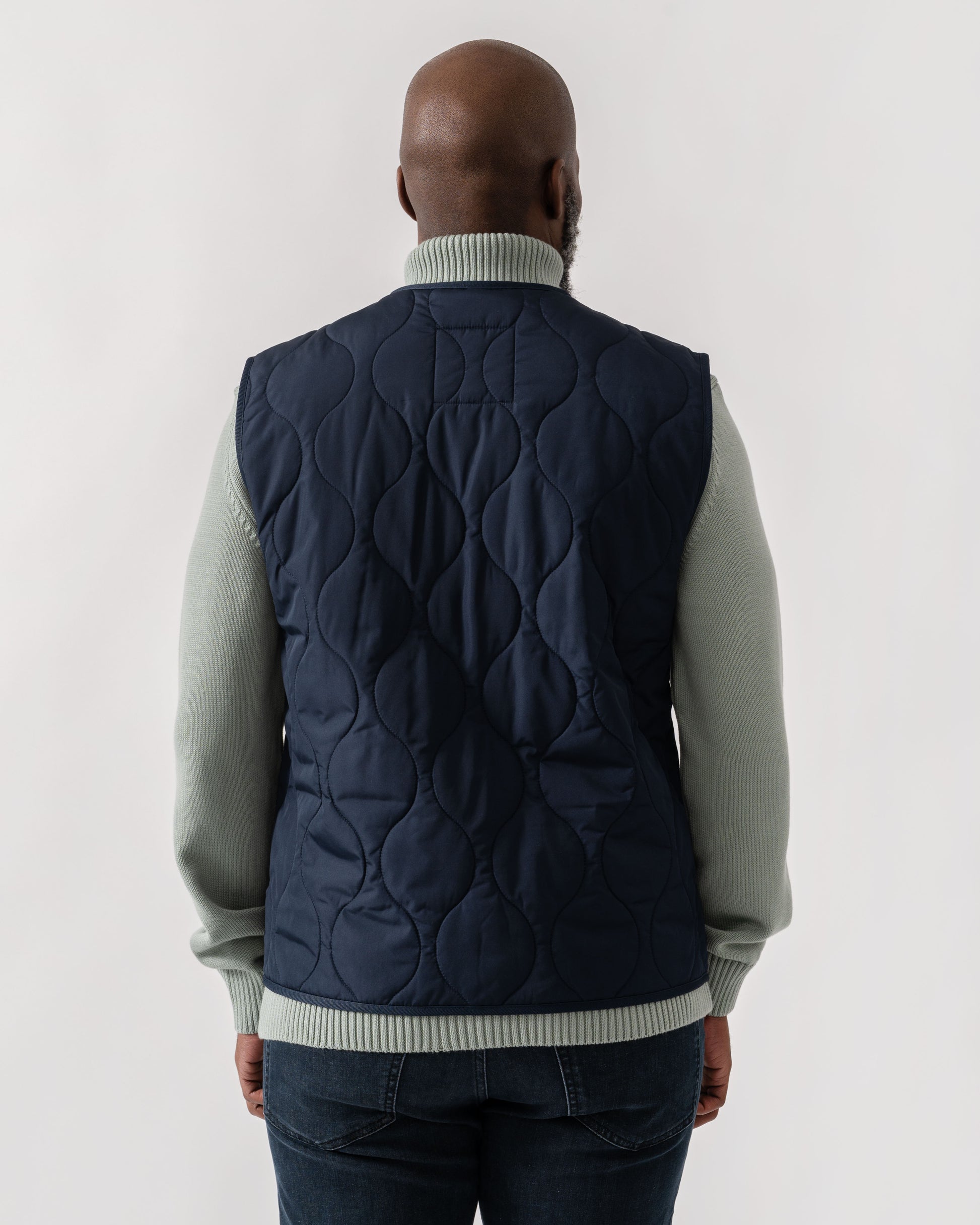 Model wearing Belstaff Base Mens Gilet in Dark Ink - Back