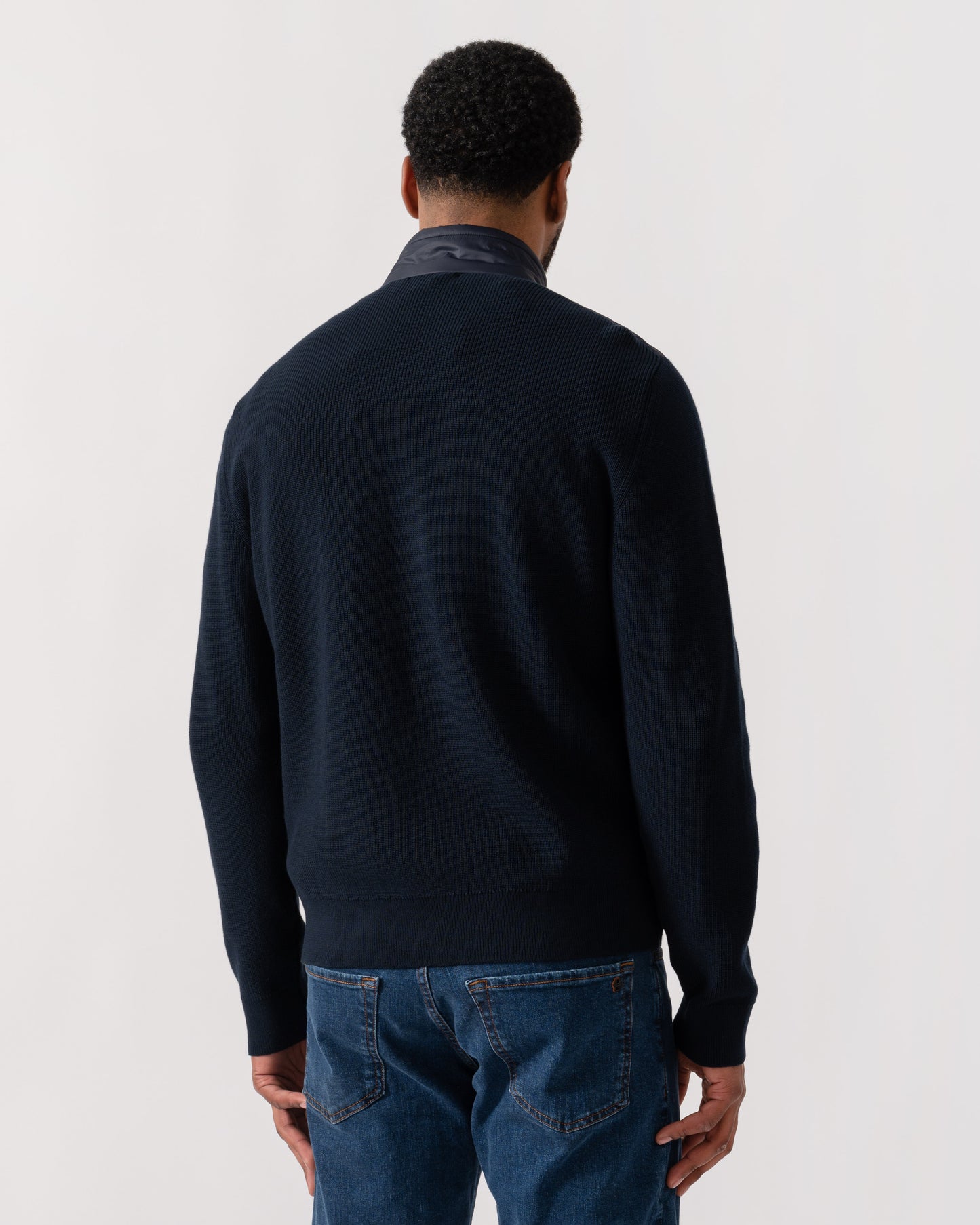 Model wearing Belstaff Control Mens Hybrid Jacket in Dark Ink - back