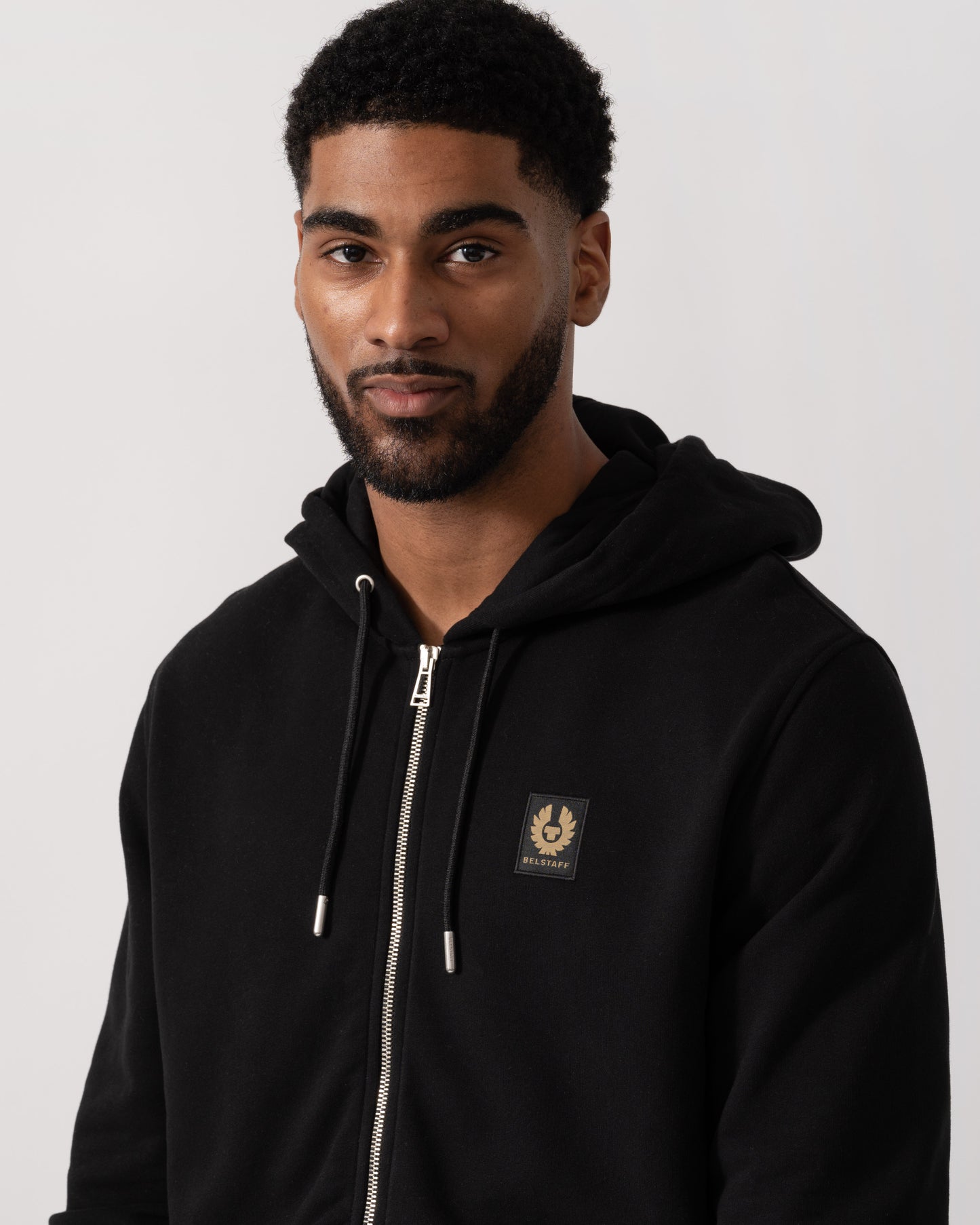Model wearing a Belstaff Mens Full Zip Hoodie in Black - Detail