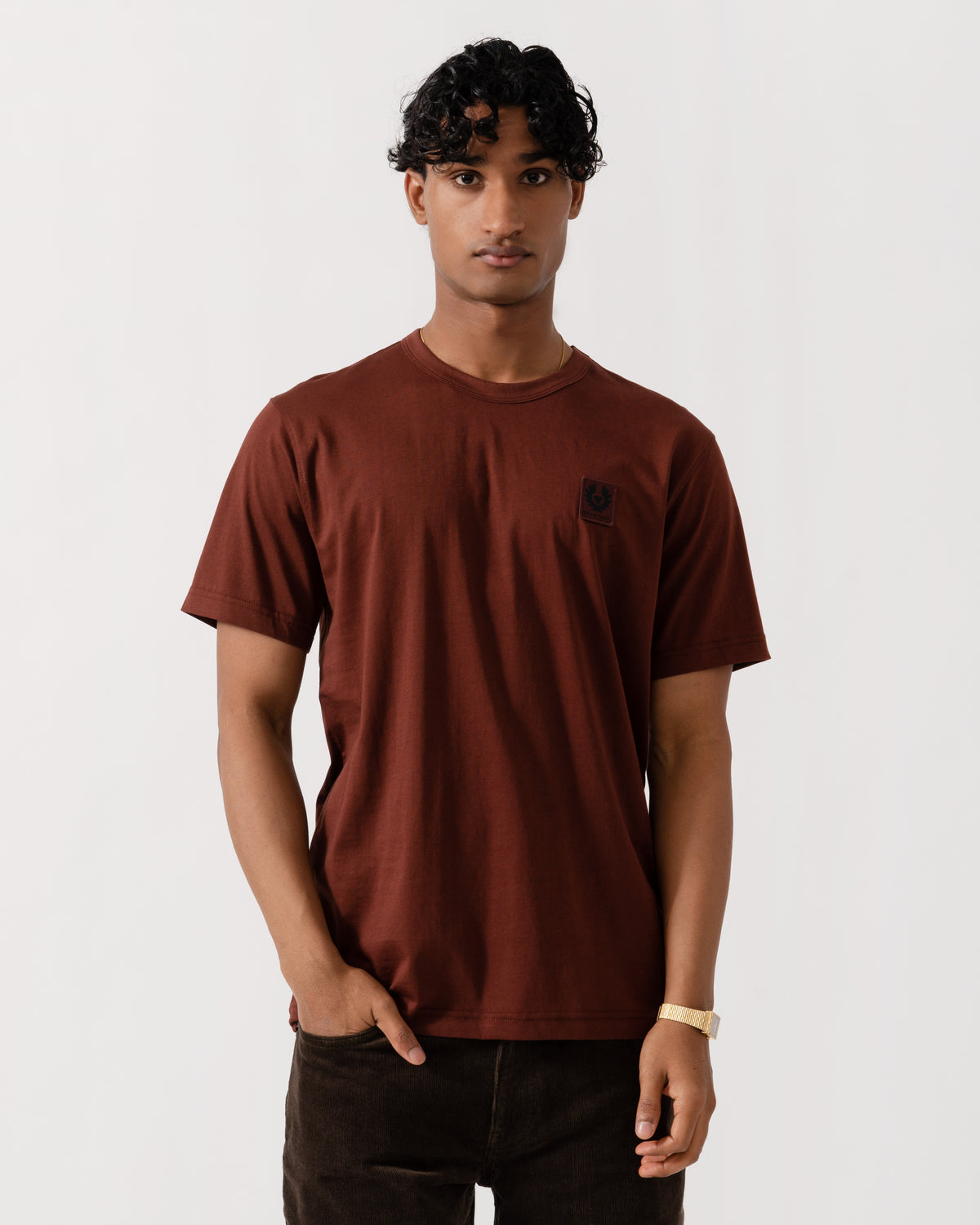 Man wearing the Belstaff Mens Icon Logo T-Shirt - Oxblood