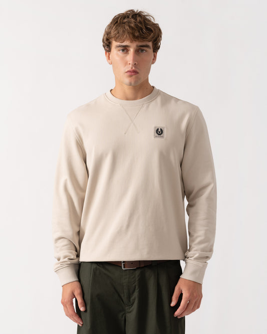 Man wearing Belstaff Mens Logo Sweatshirt - Pale Stone