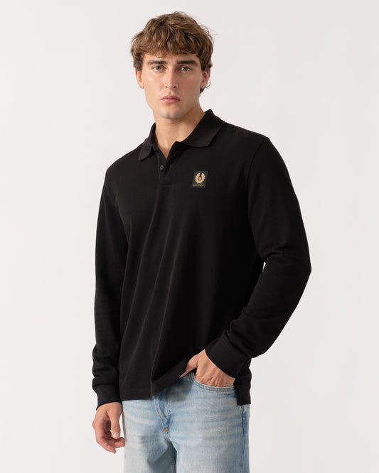 Man wearing Belstaff Mens Long Sleeved Logo Polo - Black