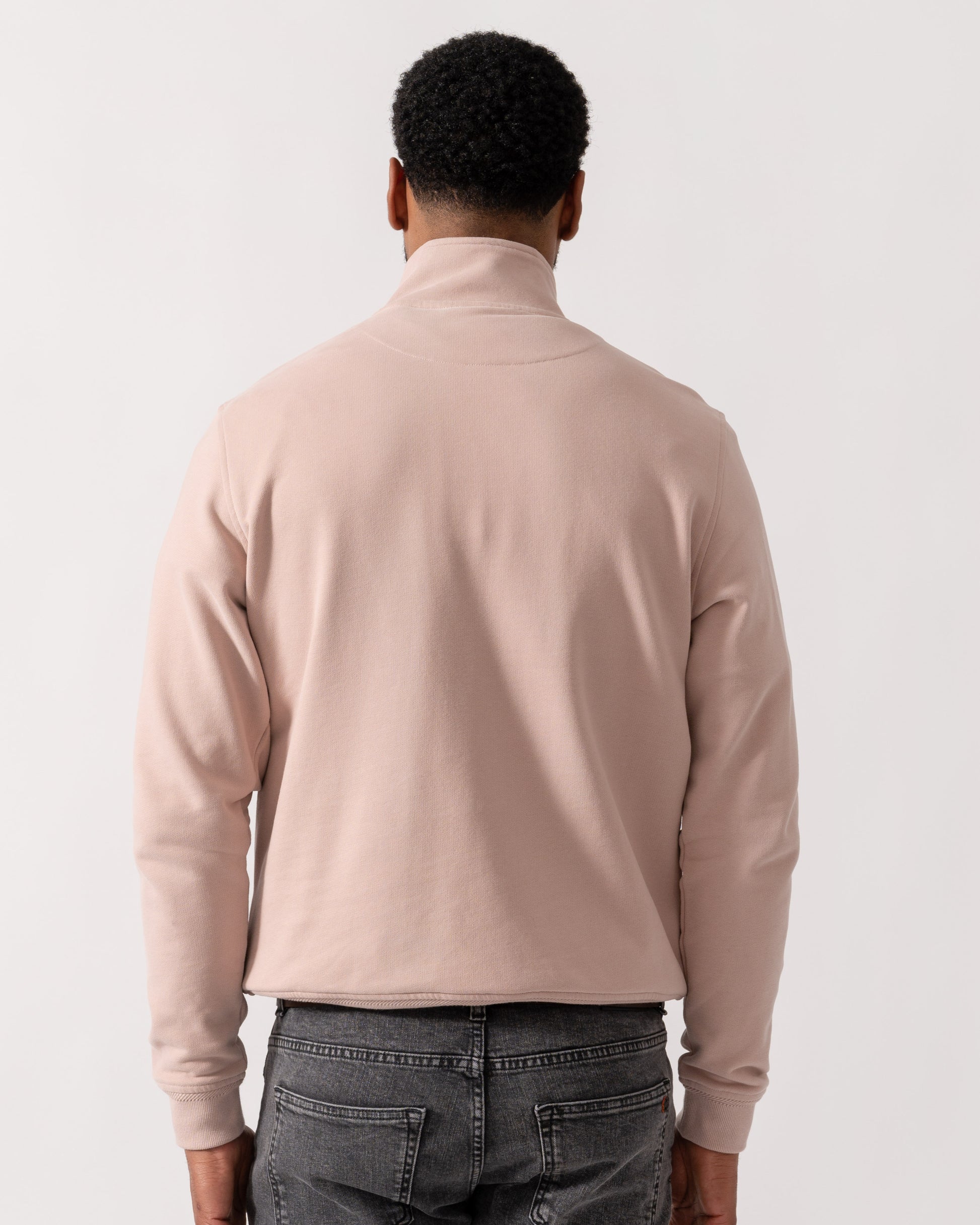 Model wearing Belstaff Quarter Zip Sweatshirt in Dusk Pink - back