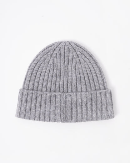 Gray knit beanie on a white background