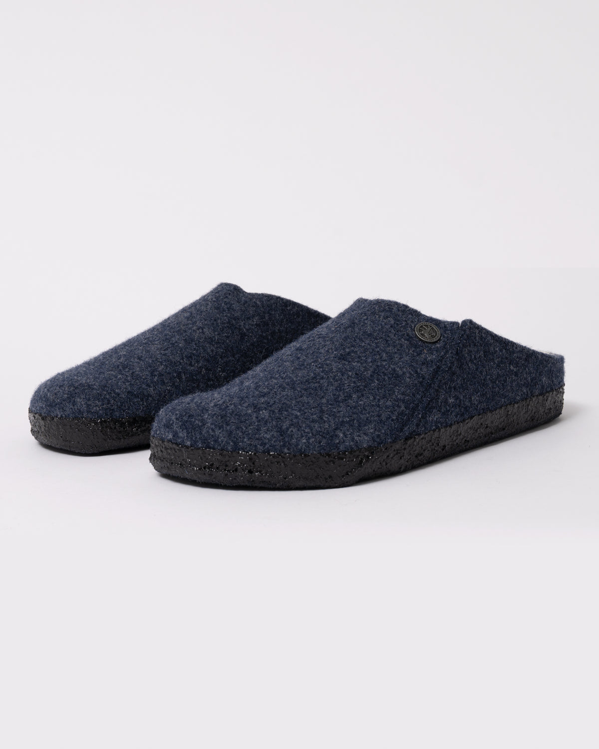 Studio photograph showing Birkenstock Zermatt Shearling FE Womens Clogs  Dark Bluen