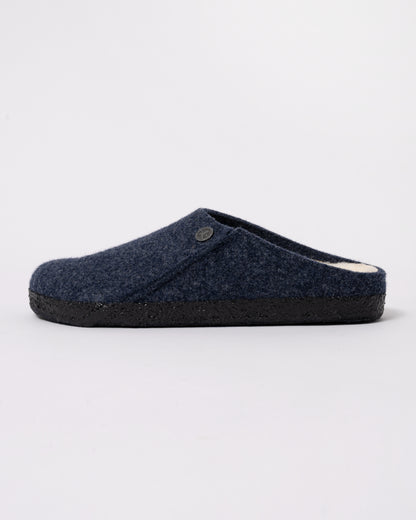 Studio photograph showing side of Birkenstock Zermatt Shearling FE Womens Clogs  Dark Bluen