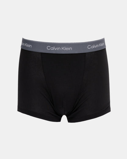 Black Calvin Klein boxer briefs on a white background