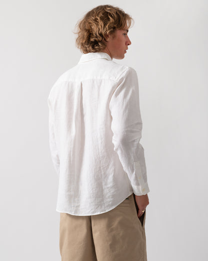 back shot of a model wearing a Colorful Standard Mens Long Sleeve Linen Shirt in Optical White