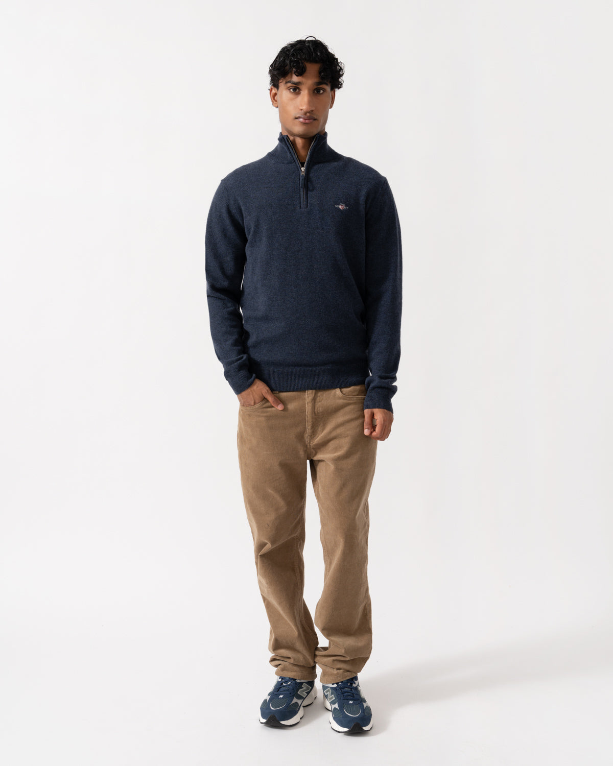 Man wearing the GANT Mens Superfine Lambswool Half Zip Sweater - 480 Dark Navy Melange
